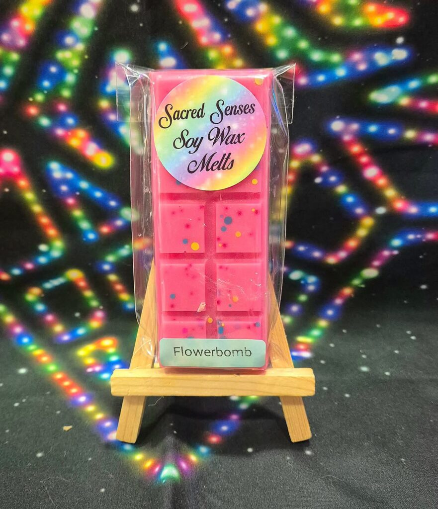 Beautiful display of a handmade soy wax melt in-store at Sacred Senses, crafted with eco-friendly soy wax